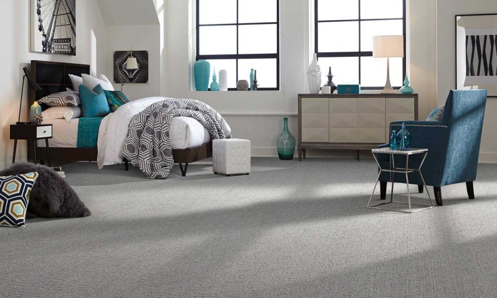 Professional cleaner vacuuming a carpet