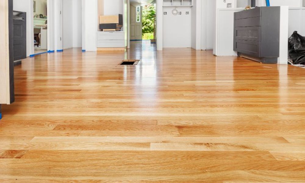 Shiny hardwood floor after professional cleaning and polishing service