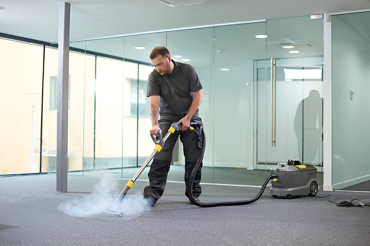 Steam cleaning the office carpet