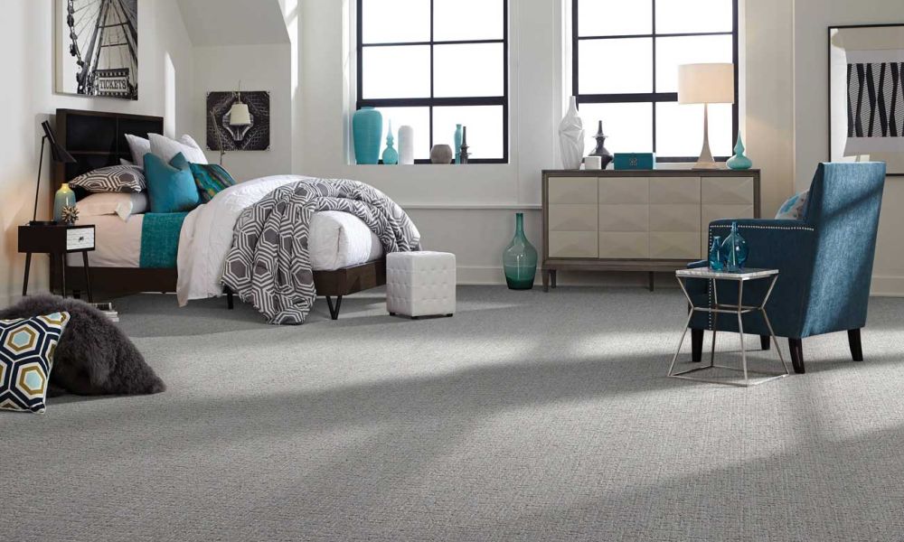 Professional cleaner vacuuming a carpet